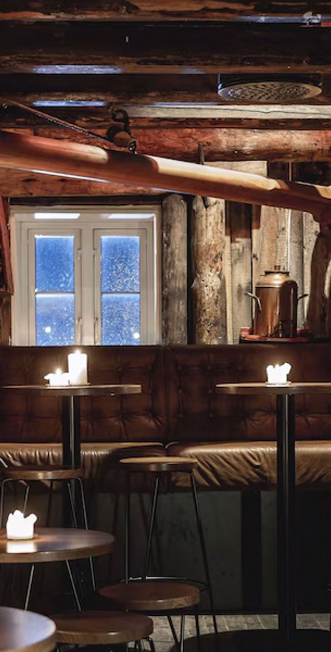 Rustic candlelit bar with wooden decor