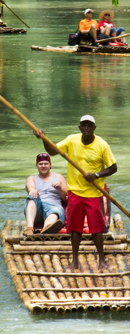 Bamboo rafting on tropical river