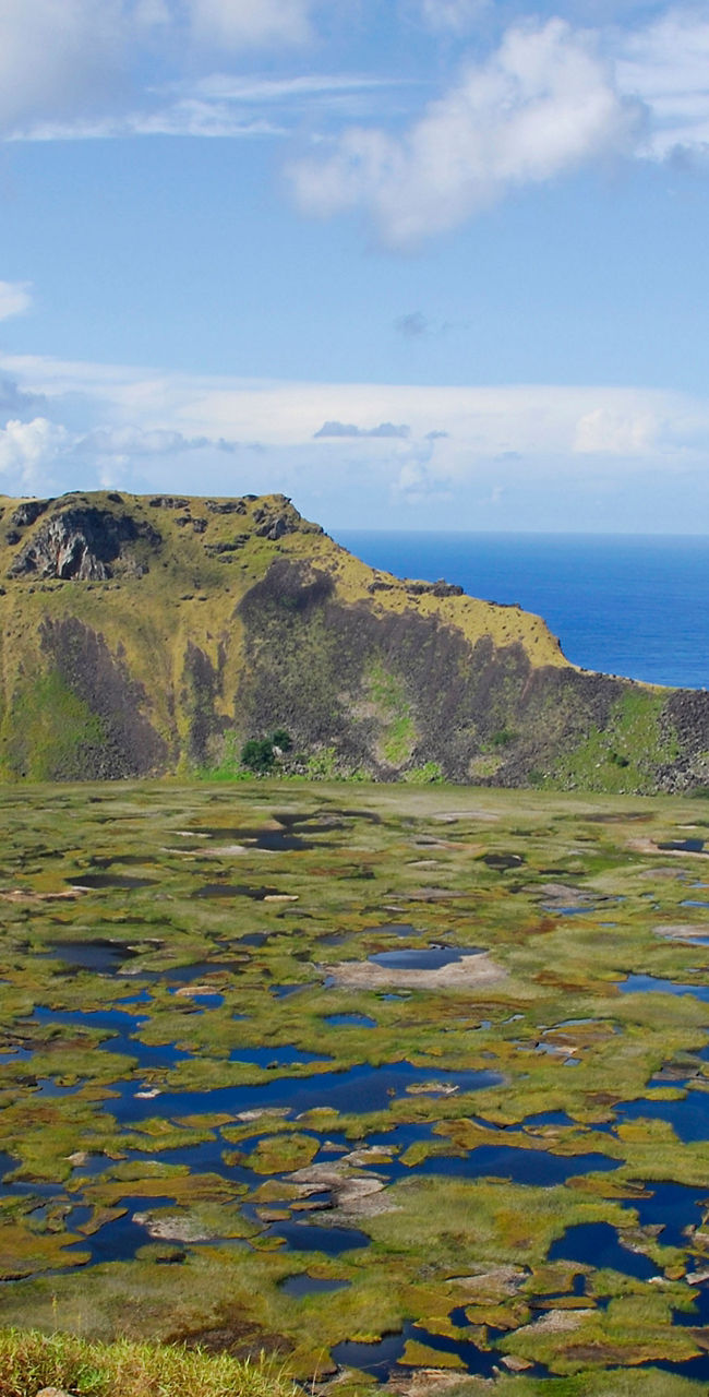 Scenic volcanic crater with lush vegetation