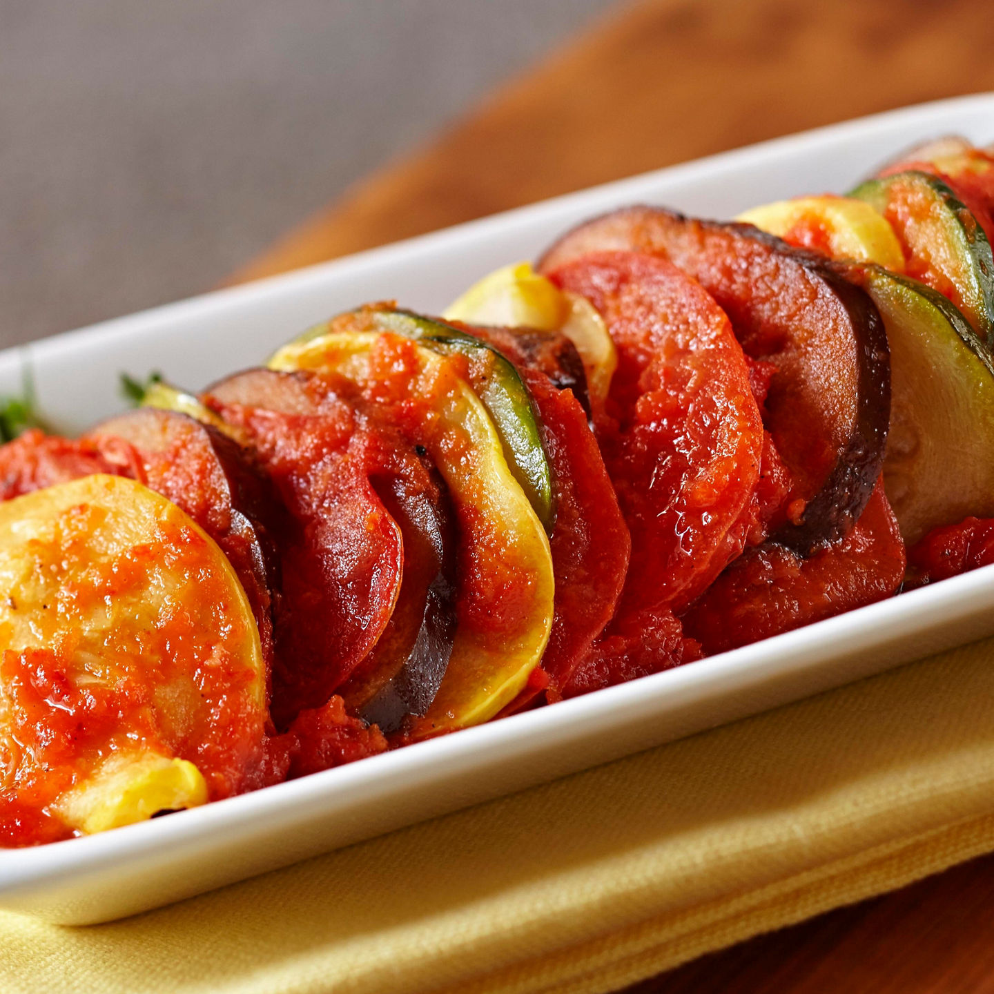 Colorful vegetable ratatouille in white dish