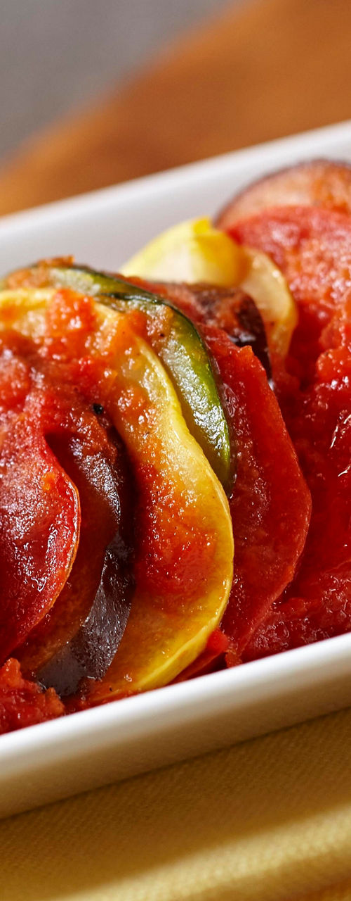 Colorful vegetable ratatouille in white dish