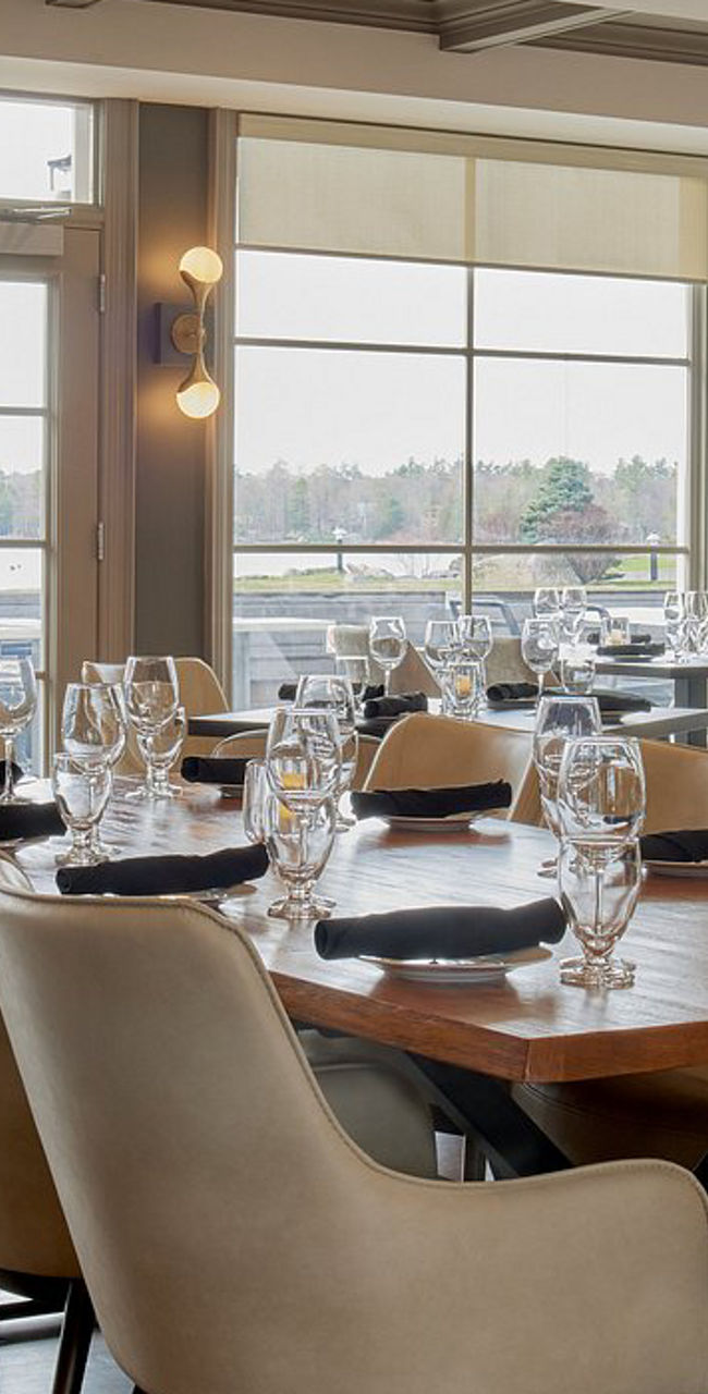 Elegant restaurant dining area with large windows