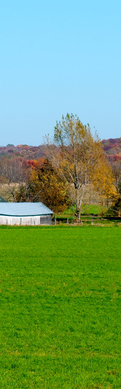 Red barn in autumn countryside landscape