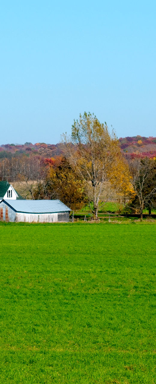 Red barn in autumn countryside landscape