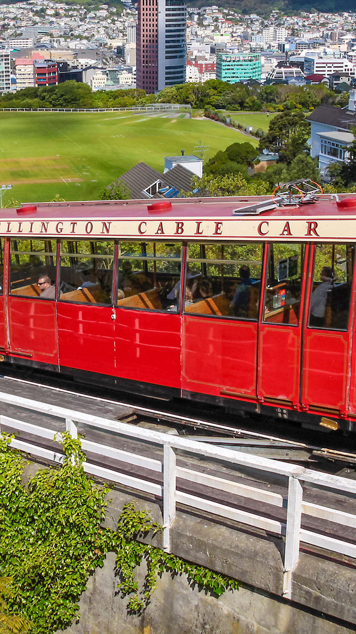 Red Wellington Cable Car overlooking cityscape