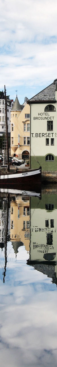 Colorful waterfront buildings with reflections