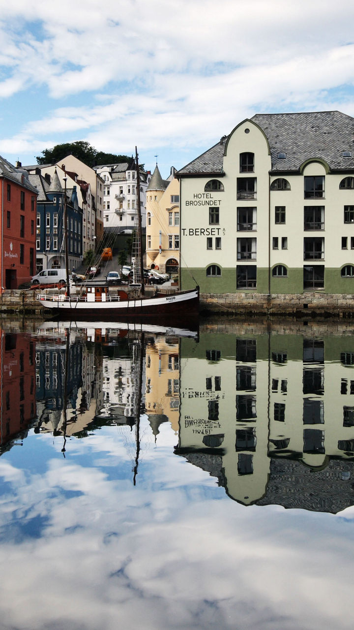 Colorful waterfront buildings with reflections