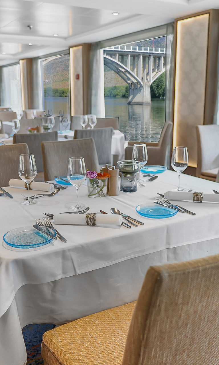 Elegant riverside dining room with scenic view
