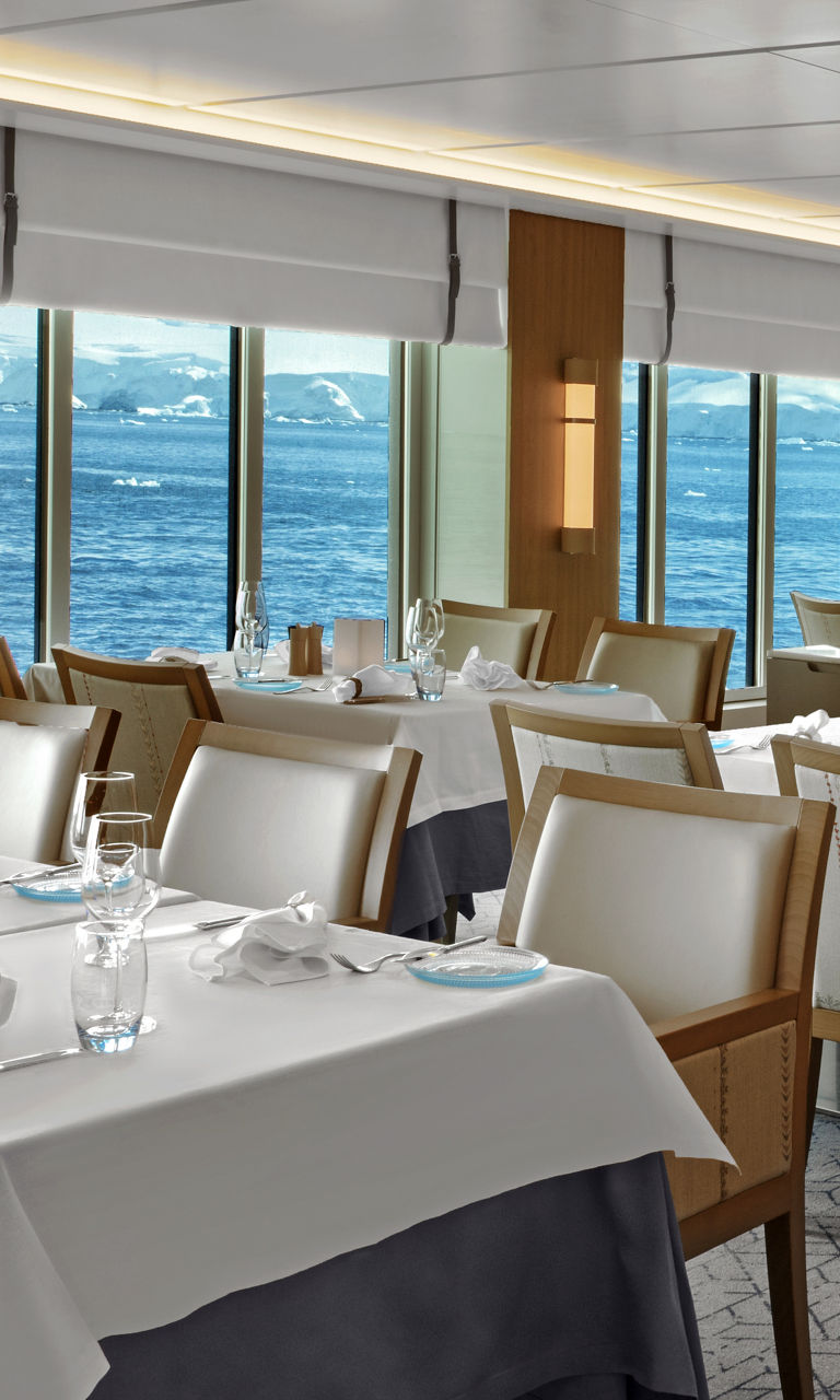 Elegant oceanfront dining room with scenic views
