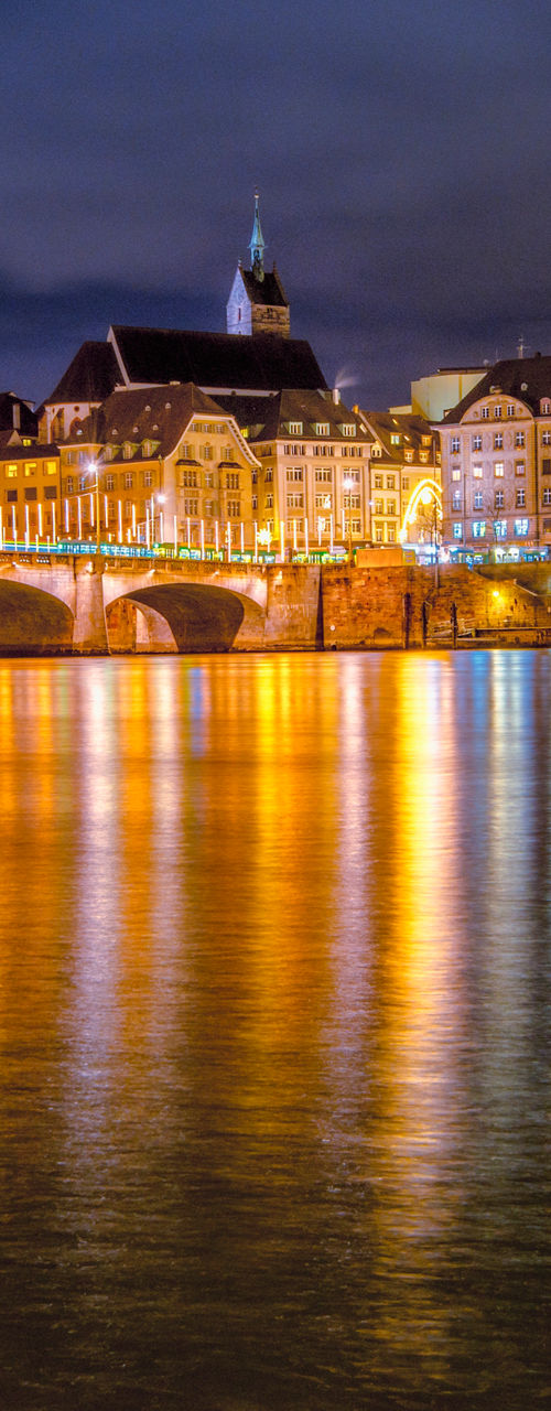 Night view of illuminated city bridge