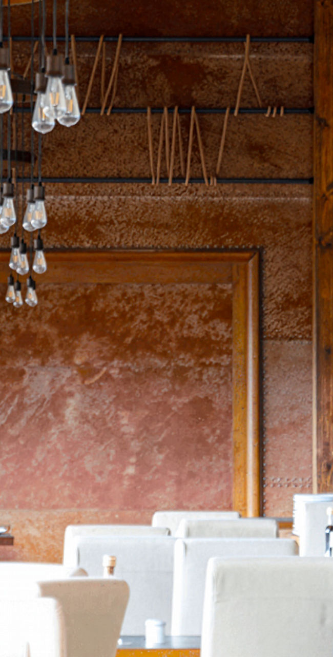 Modern rustic restaurant interior with warm lighting