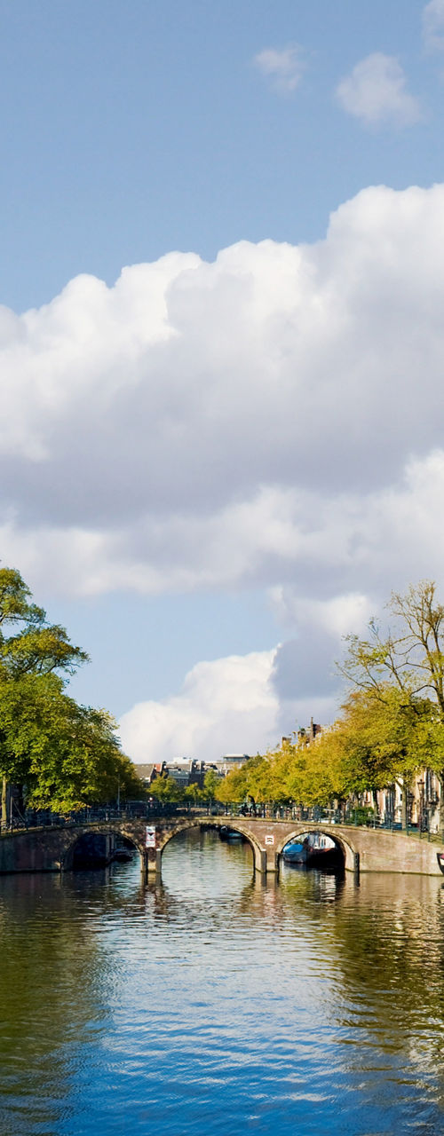 Scenic canal view in Amsterdam cityscape
