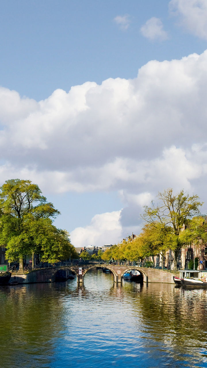 Scenic canal view in Amsterdam cityscape