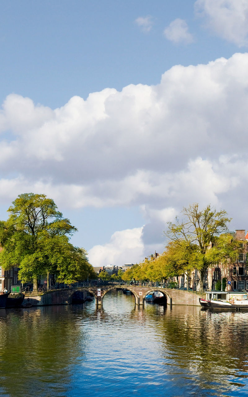 Scenic canal view in Amsterdam cityscape