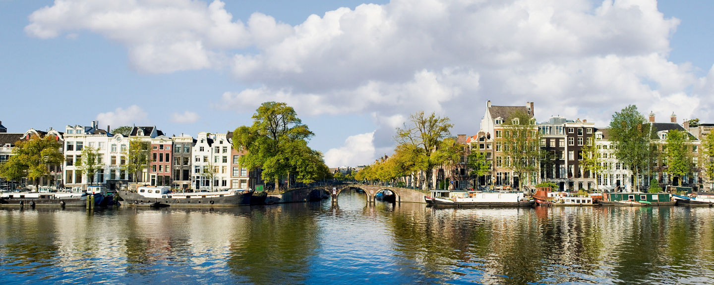 Scenic canal view in Amsterdam cityscape