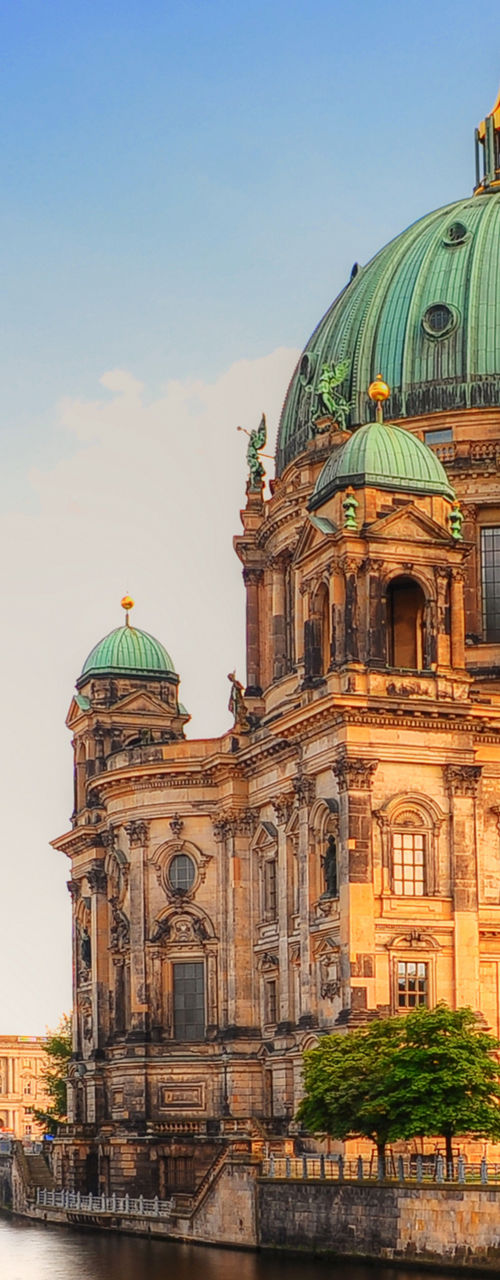 Berlin Cathedral by riverside at sunset