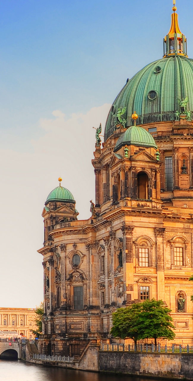 Berlin Cathedral by riverside at sunset
