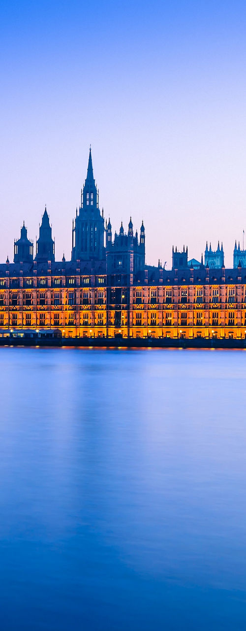 Illuminated Houses of Parliament at dusk