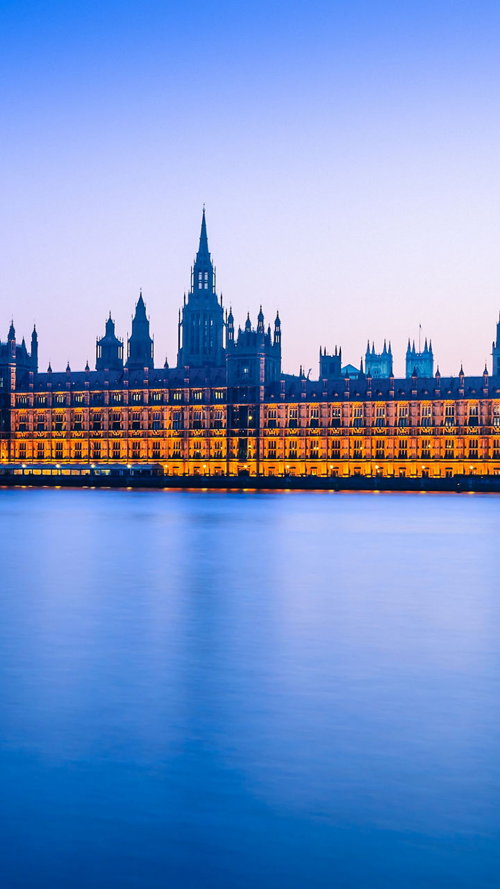 Illuminated Houses of Parliament at dusk