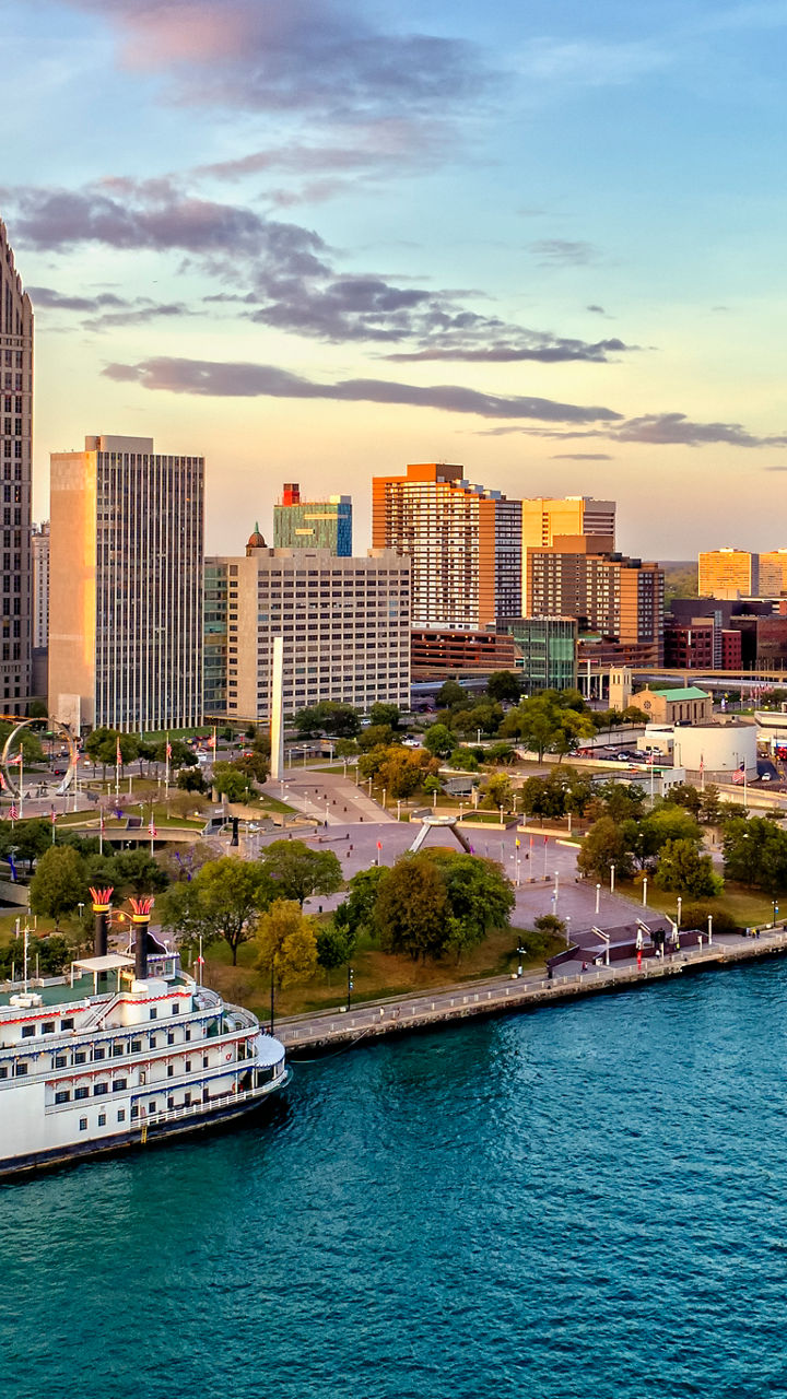Detroit skyline at sunset with river view
