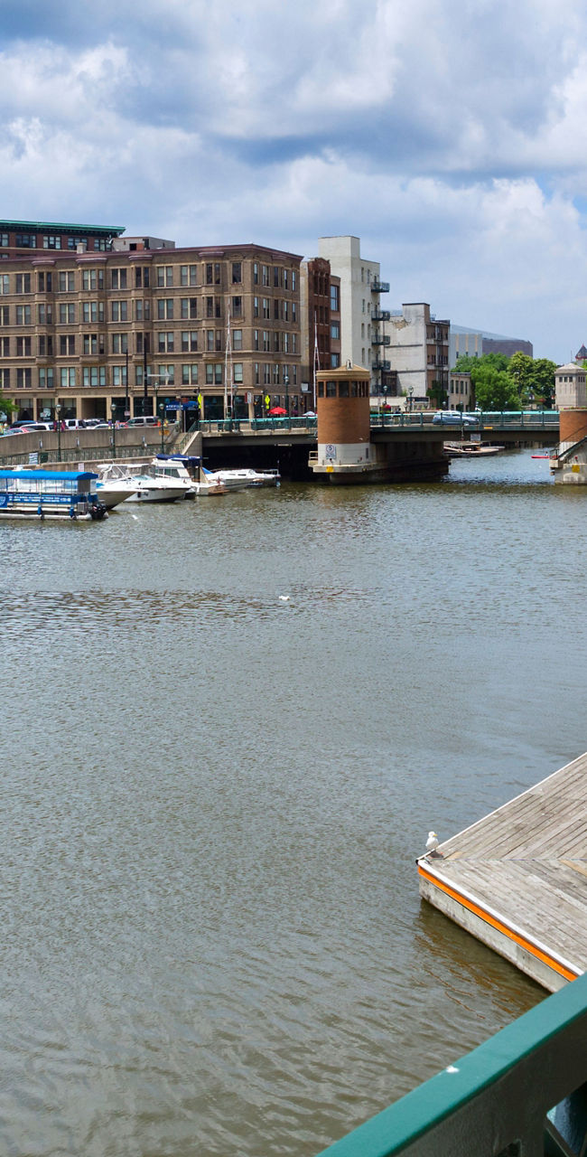 Scenic urban riverfront with historic buildings