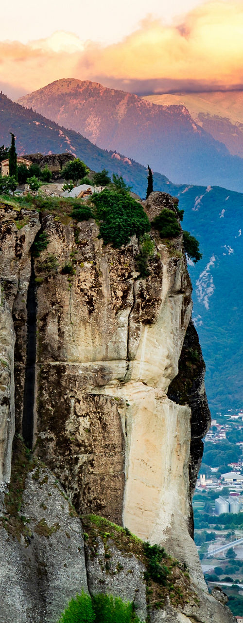 Monastery perched on towering rock formation
