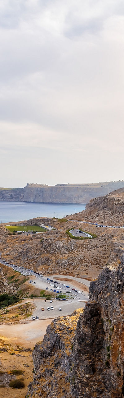 Ancient ruins overlooking a coastal landscape