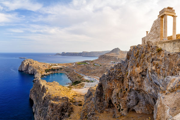 Ancient ruins overlooking a coastal landscape