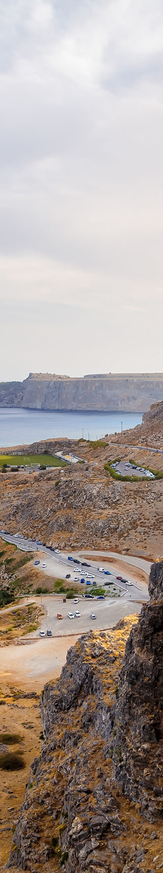 Ancient ruins overlooking a coastal landscape