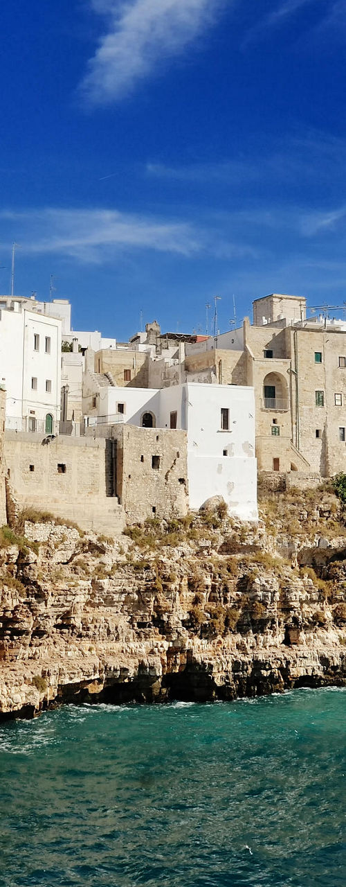 Cliffside town overlooking turquoise waters