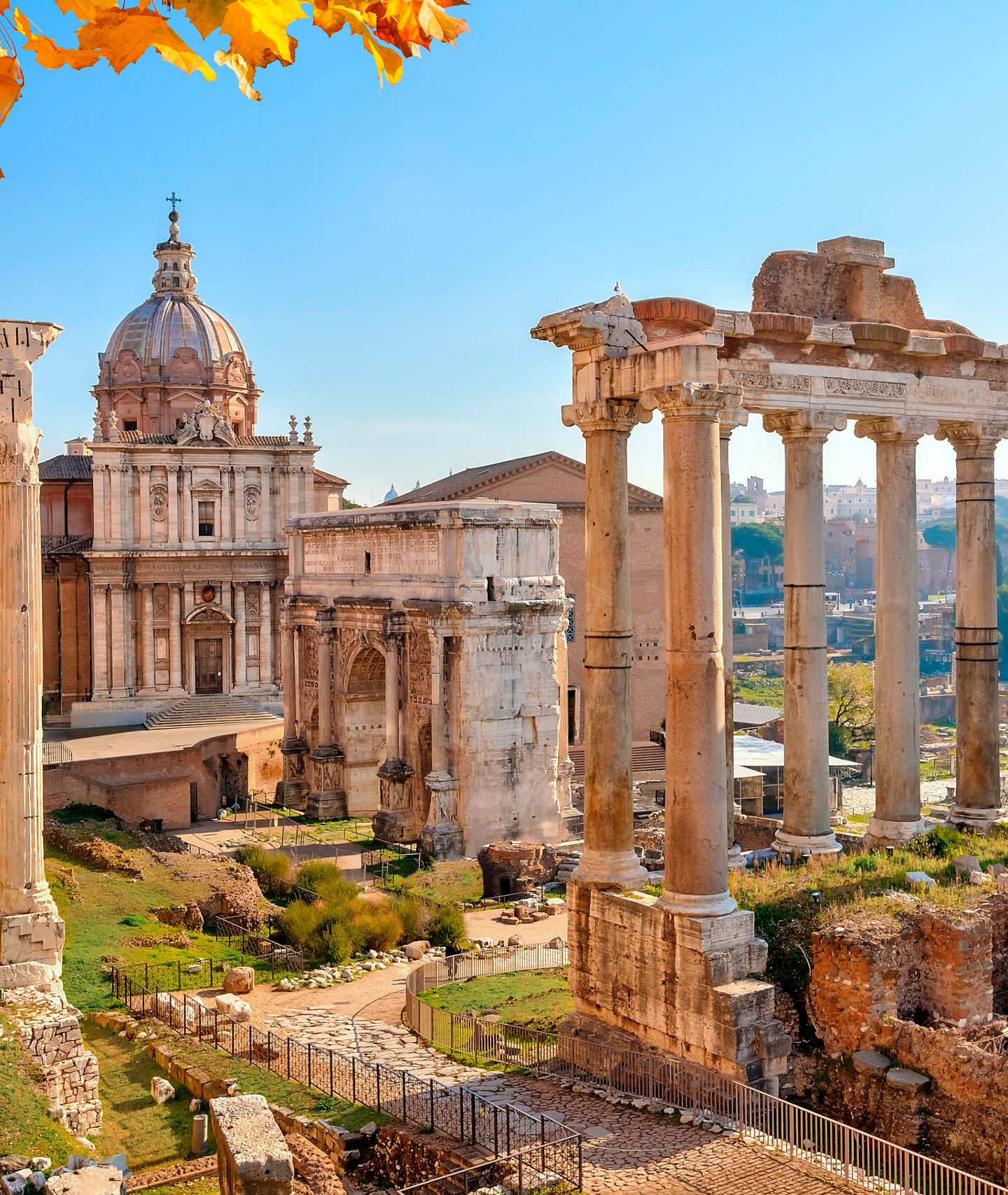 Ancient Roman ruins with autumn foliage