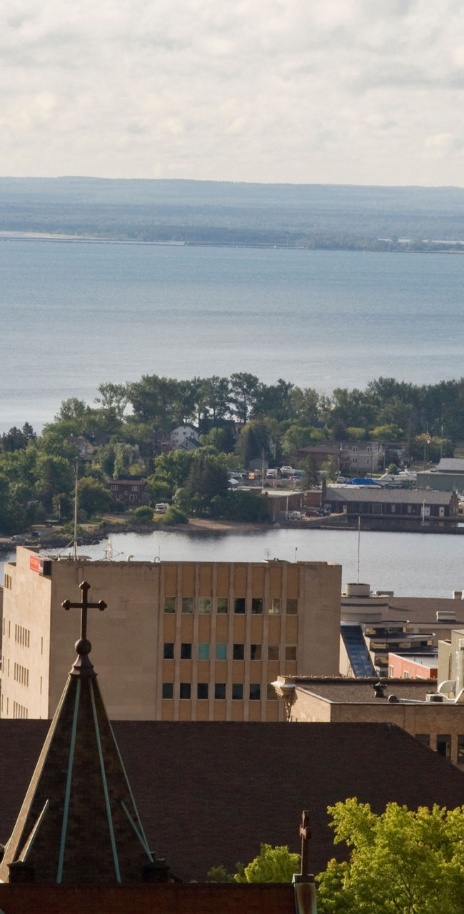 Scenic cityscape with church and waterfront view