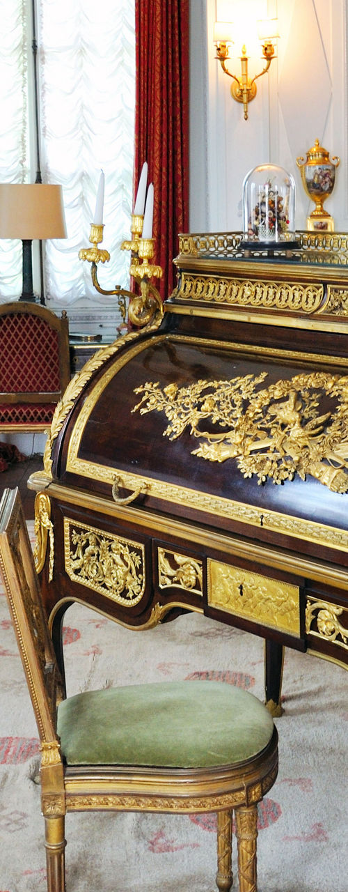Elegant antique desk in luxurious room