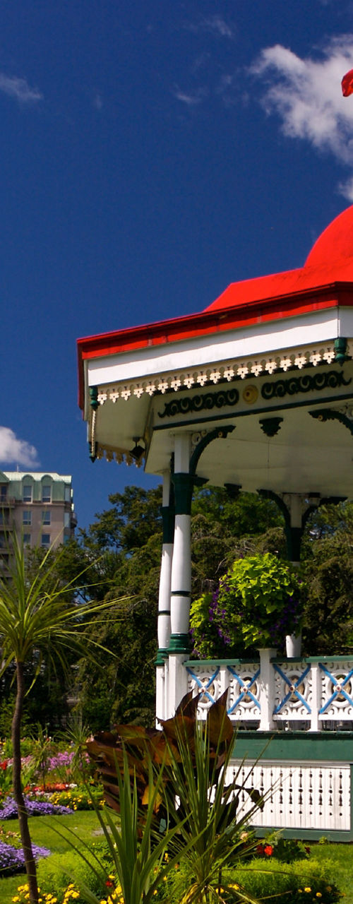 Colorful garden with gazebo and Canadian flag