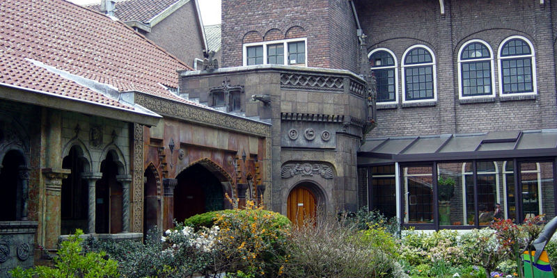 Historic brick architecture with garden view