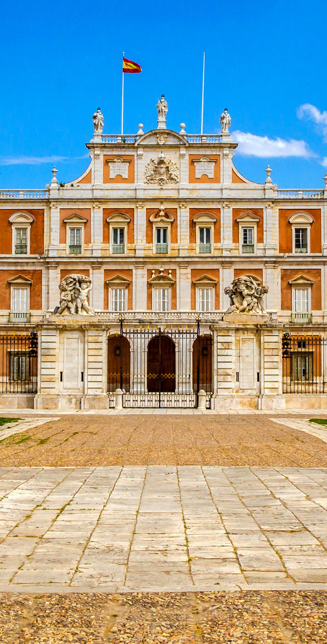 Historic palace with Spanish flag flying