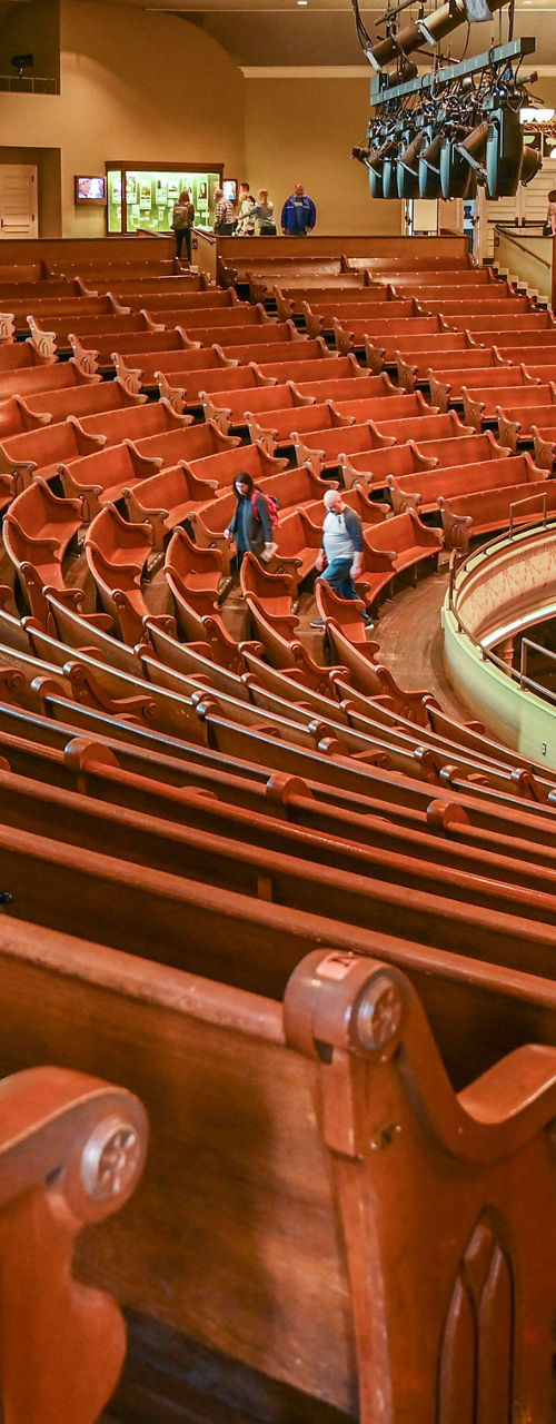 Historic theater interior with wooden seating