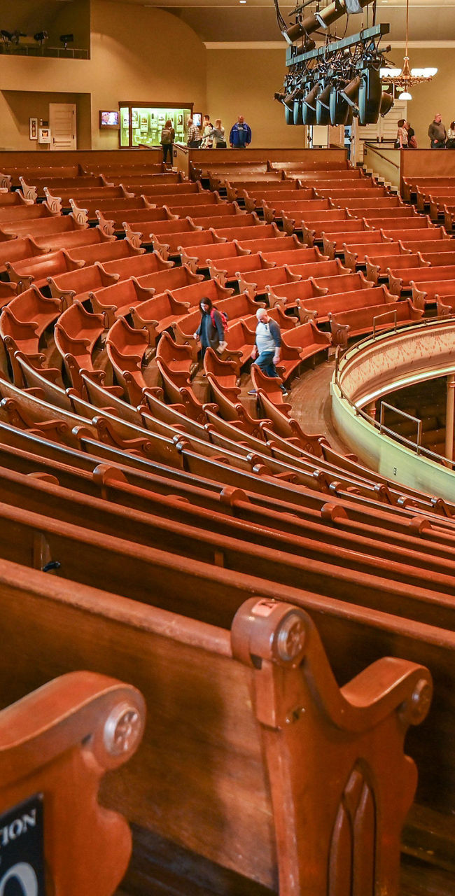 Historic theater interior with wooden seating