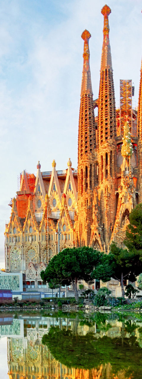 Sagrada Familia reflected in tranquil pond