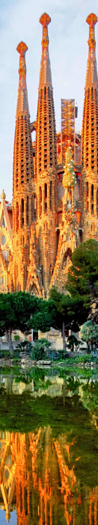 Sagrada Familia reflected in tranquil pond