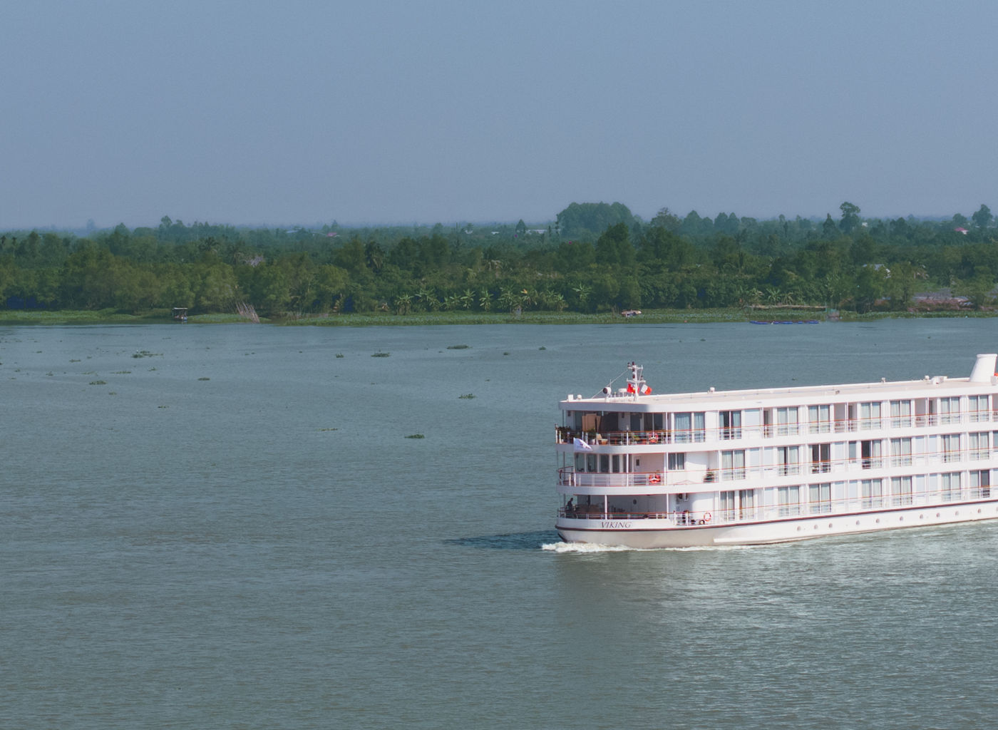 Luxury river cruise ship on calm waters