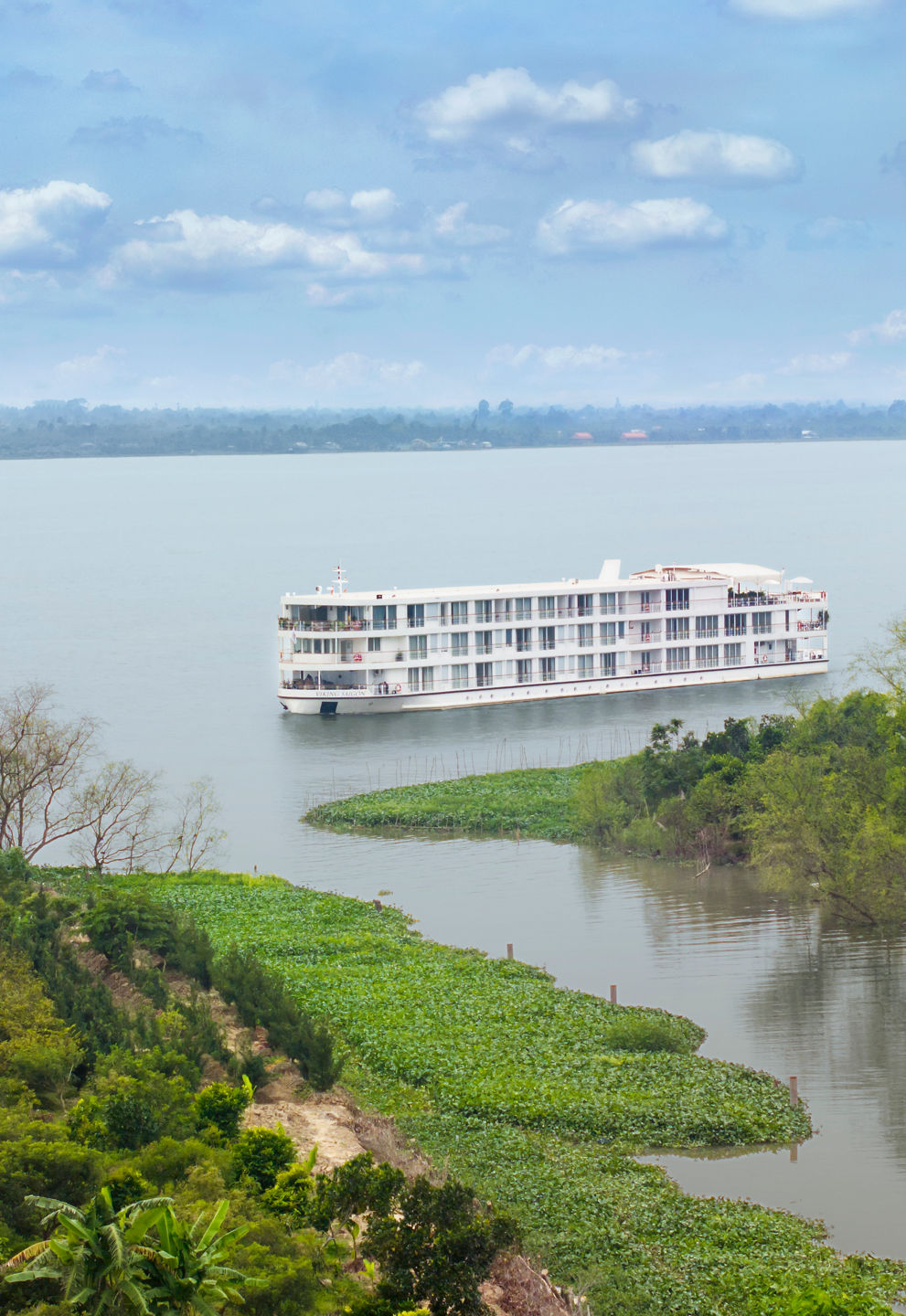 Luxury river cruise ship on calm waters