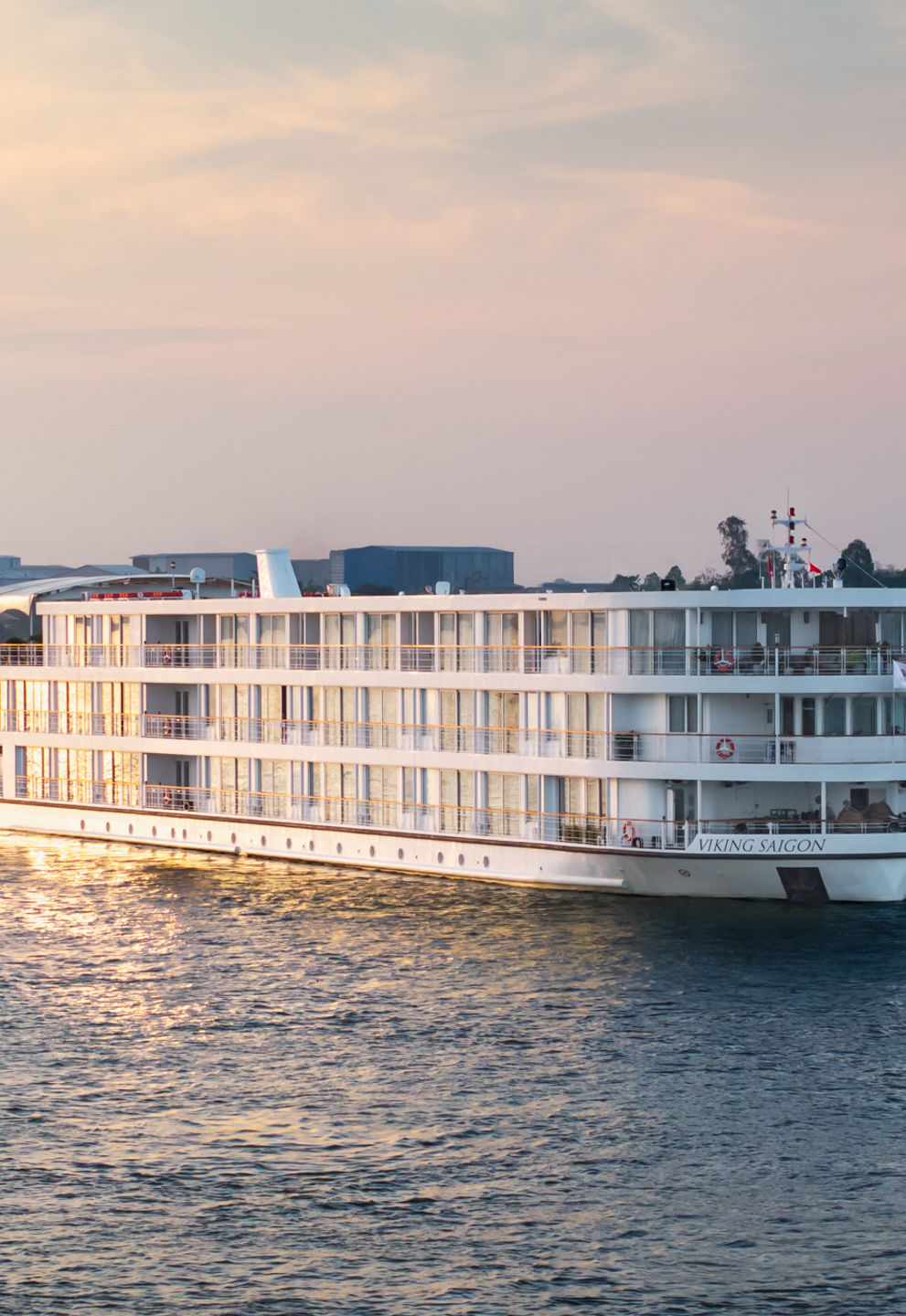 Luxury river cruise ship at sunset