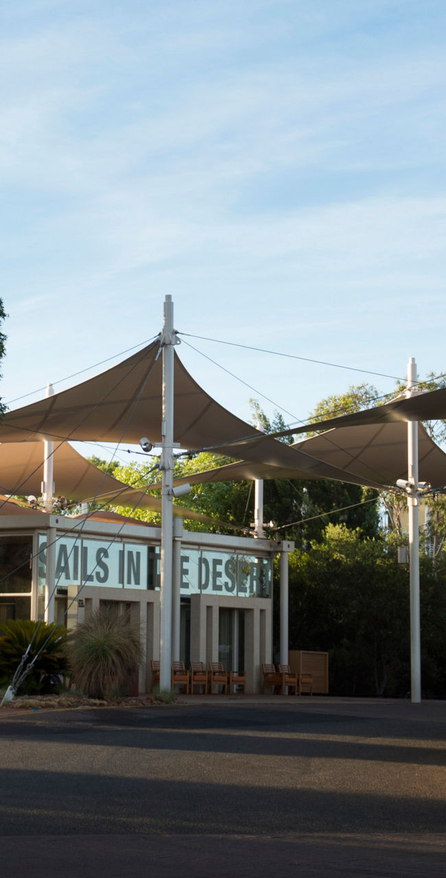 Outdoor building with shade sails