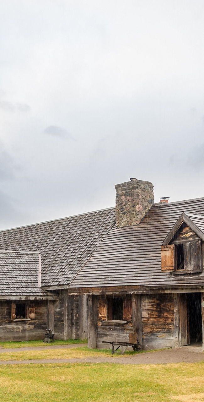 Historic wooden church and lodge in rural setting