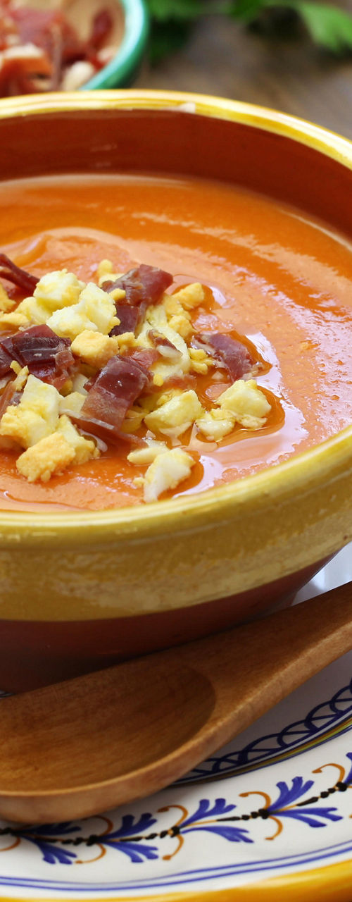 Traditional tomato soup with garnishes