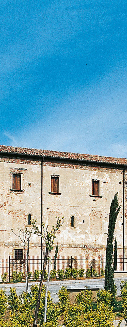 Historic stone building with bell tower
