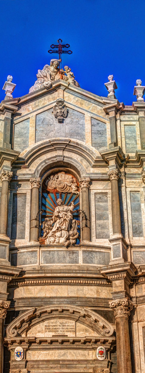 Baroque cathedral facade under clear sky