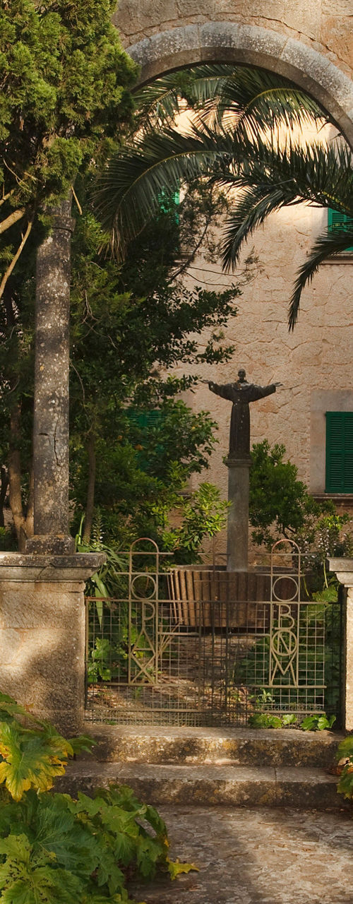 Mediterranean courtyard with stone arches