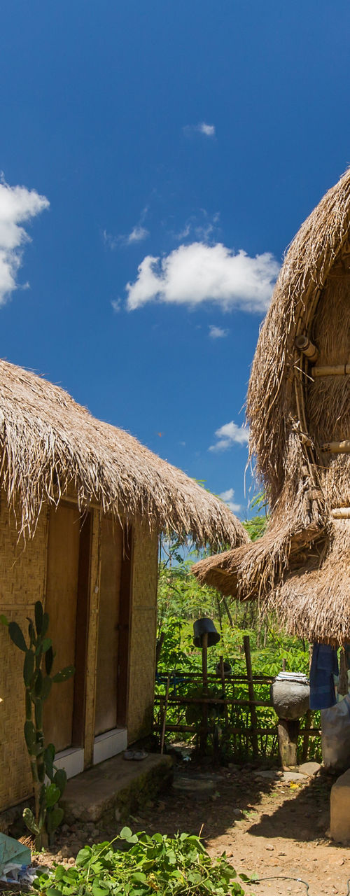 Traditional thatched huts in rural village